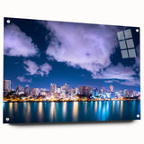 Large abstract wall art of Caribbean scenery in vibrant blue and green tones on acrylic glass.