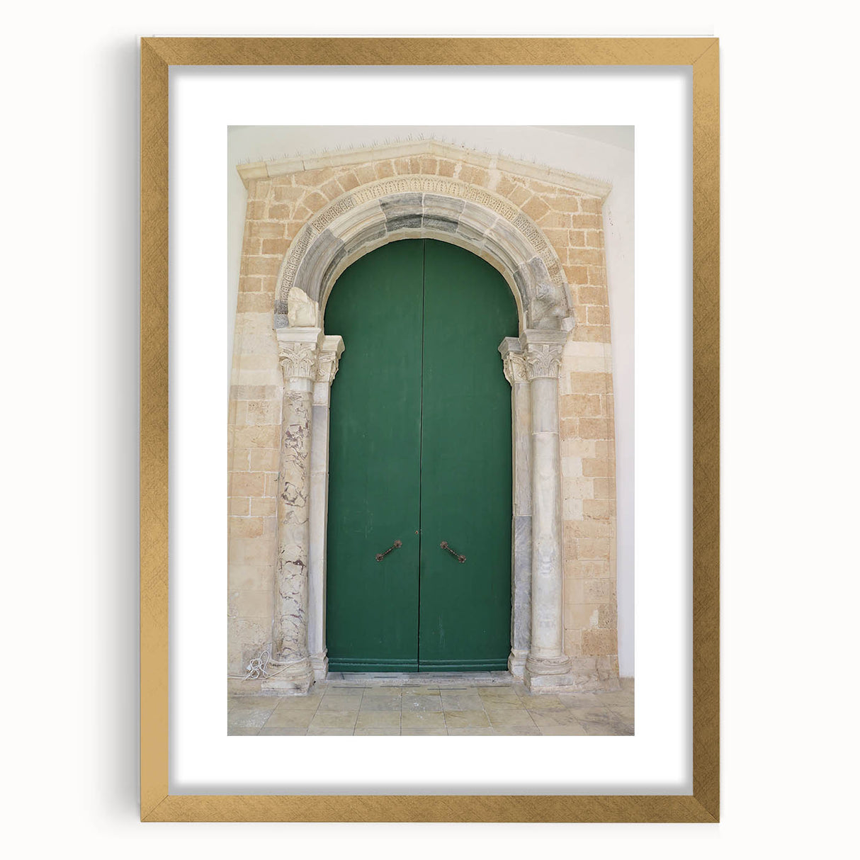 Extra large wall art featuring an abstract print of a Caribbean scenery in muted gold and blue tones, framed in gold.