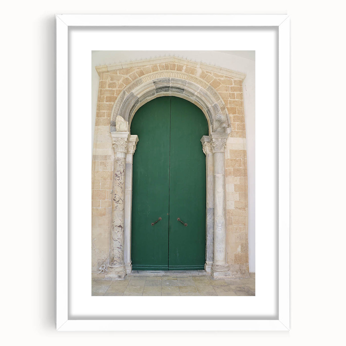 Abstract art print of a Caribbean scene in muted blue and green tones on a framed white mat, ideal for dining room decor.