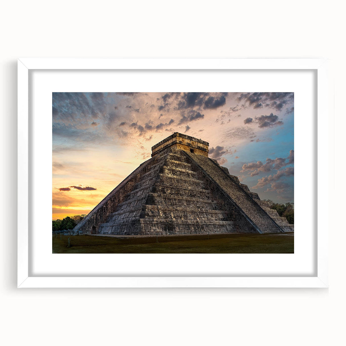 Abstract art print of Central America scenery in muted green and blue tones on a framed white mat.