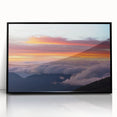 Large abstract wall art depicting a Central American scenery in muted earth tones on a black framed acrylic.