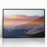 Large abstract wall art depicting a Central American scenery in muted earth tones on a black framed acrylic.