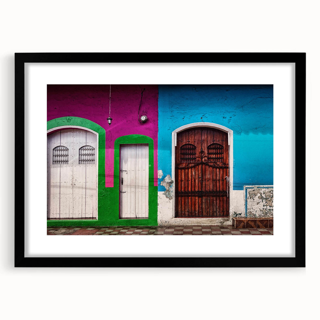Colorful abstract art print of a vibrant Central American scenery on a textured, extra large canvas, framed in black.