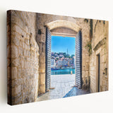 Large canvas print depicting the scenic Croatian coastline in muted blue and green tones, suitable for kitchen wall art.