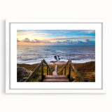 Textured abstract art print featuring muted earth tones, framed in white, ideal for bedroom wall decor.
