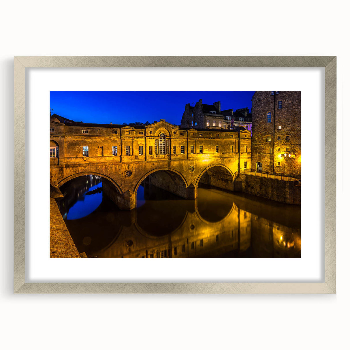 Extra large abstract art print of a European scenery in muted earth tones, framed in silver, ideal for living room decor.