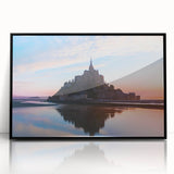 Large abstract wall art depicting a scenic European landscape, rendered in muted earth tones on a black framed acrylic.