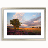 Extra large abstract art print of a textured French landscape in muted earth tones, framed in silver.
