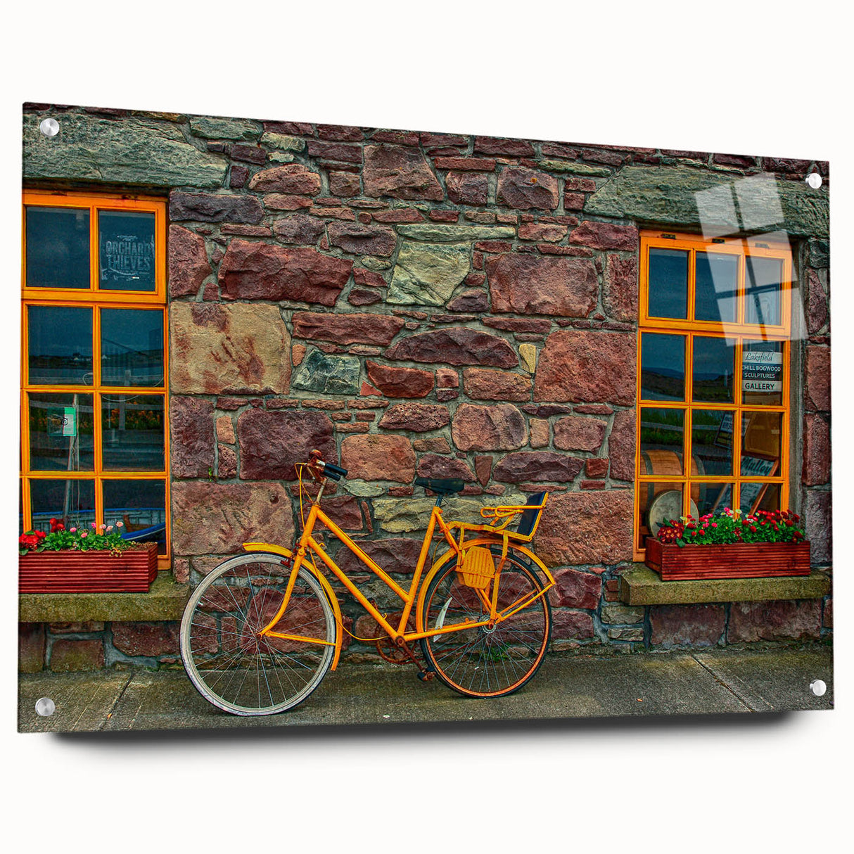 Acrylic glass print of a serene Irish landscape, featuring lush green fields under a cloudy sky, ideal for dining room decor.
