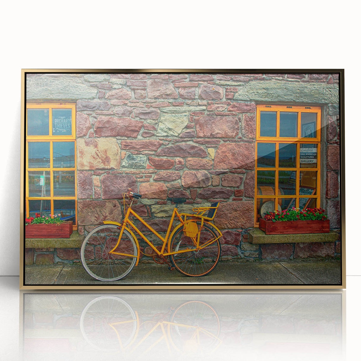 Acrylic print of a serene Irish landscape in muted green and gold tones, framed in gold, suitable for modern art wall decor.