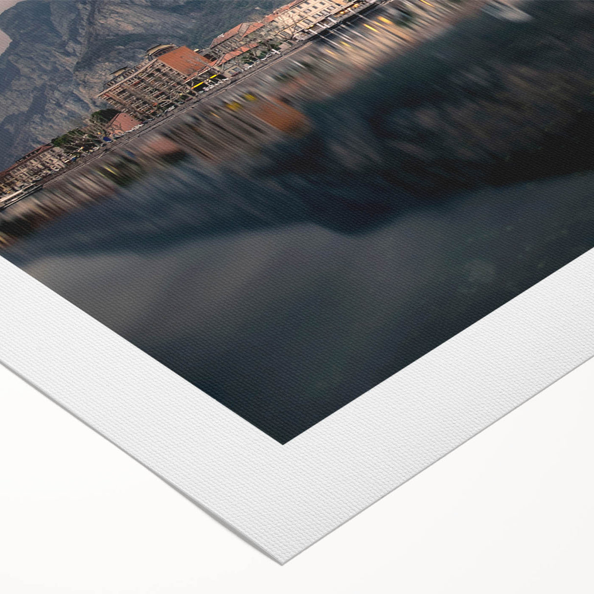 Art deco poster of Lake Como with muted blue and green tones on rolled canvas, suitable for dining room walls.