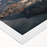 Art deco poster of Lake Como with muted blue and green tones on rolled canvas, suitable for dining room walls.
