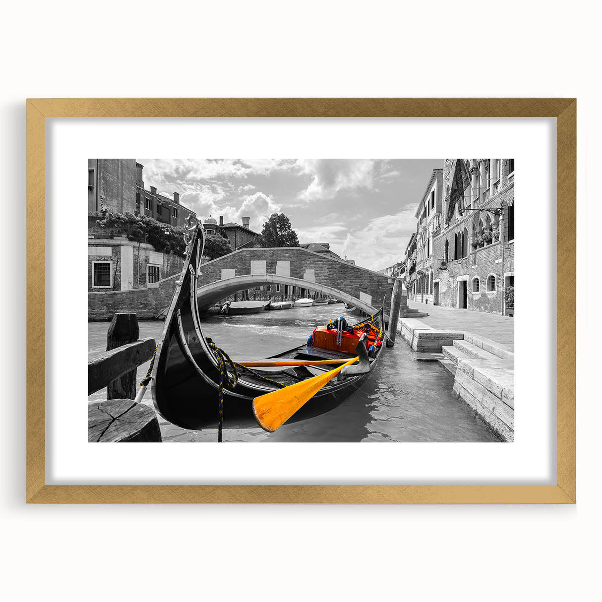 Abstract art print of Venice scenery in muted gold and blue tones on a framed canvas, suitable for dining room decor.