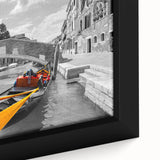 Close-up of a textured black wall art depicting Venice scenery on a framed canvas, with vivid colors.