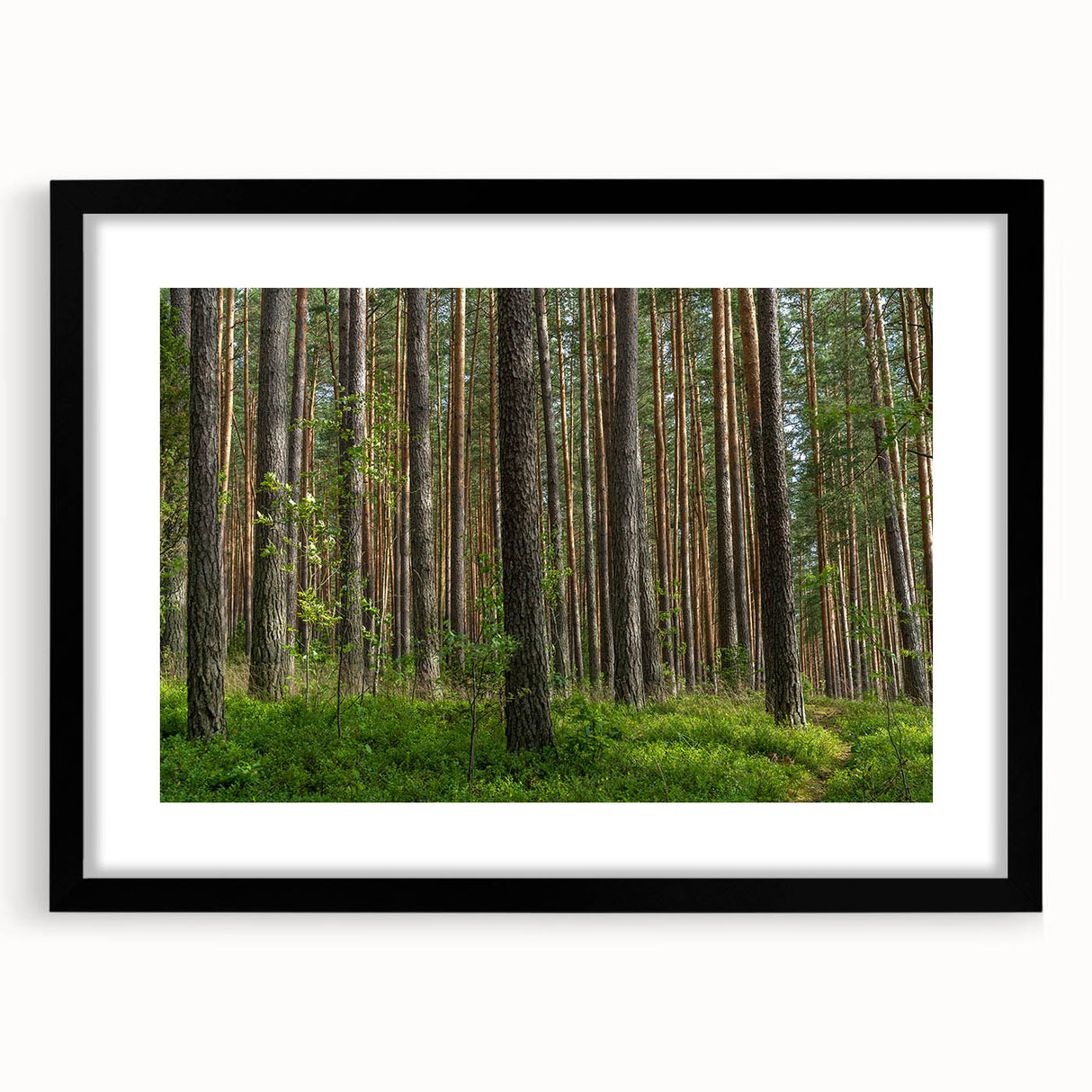 Abstract art print featuring a colorful, textured depiction of a European scenery in a black framed mat.