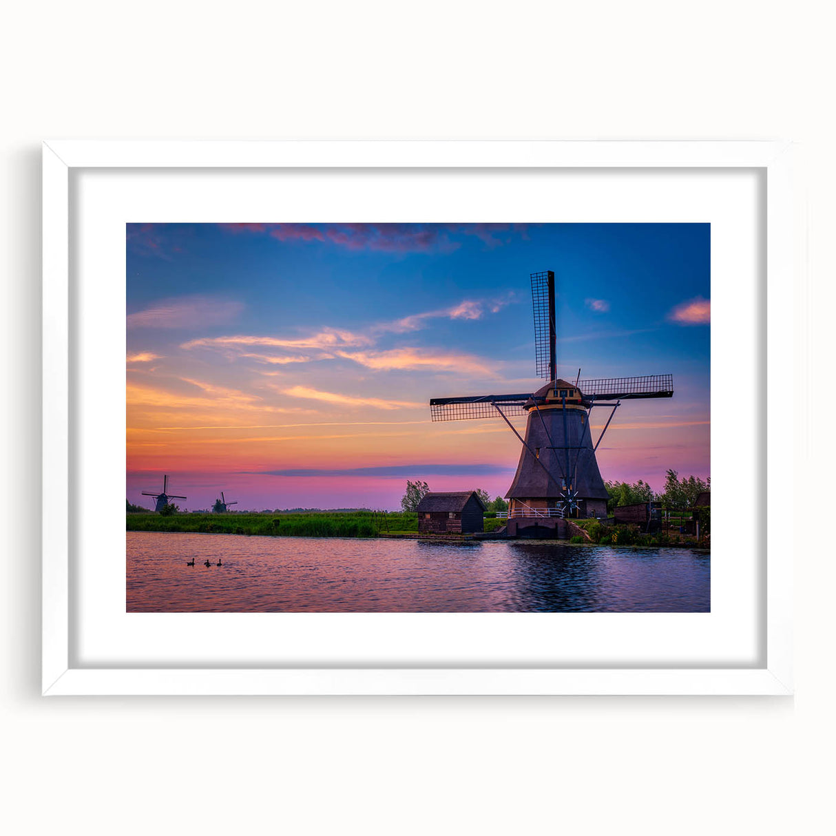 Textured abstract art print of a European landscape in muted earth tones, framed with a white mat.