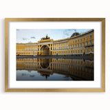Abstract art print of a European cityscape in muted gold and black tones, framed with a gold mat.