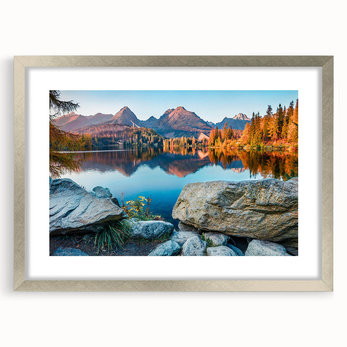 Extra large abstract art print of a European scenery in silver frame with mat, featuring textured gray and blue tones.