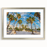 Textured abstract art print of Valencia scenery in muted earth tones, framed in silver, ideal for bedroom decor.