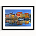 Extra large abstract art print of Stockholm's colorful, textured skyline on a black framed canvas.
