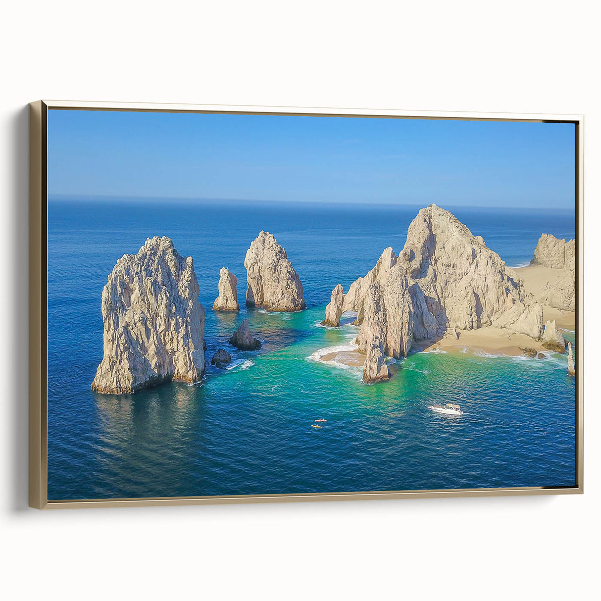 Framed canvas depicting a vintage-style landscape of Cabo San Lucas with muted gold and black tones.
