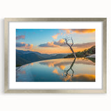 Textured abstract art print depicting a muted color palette of Oaxaca scenery, framed in silver, ideal for bedroom art.