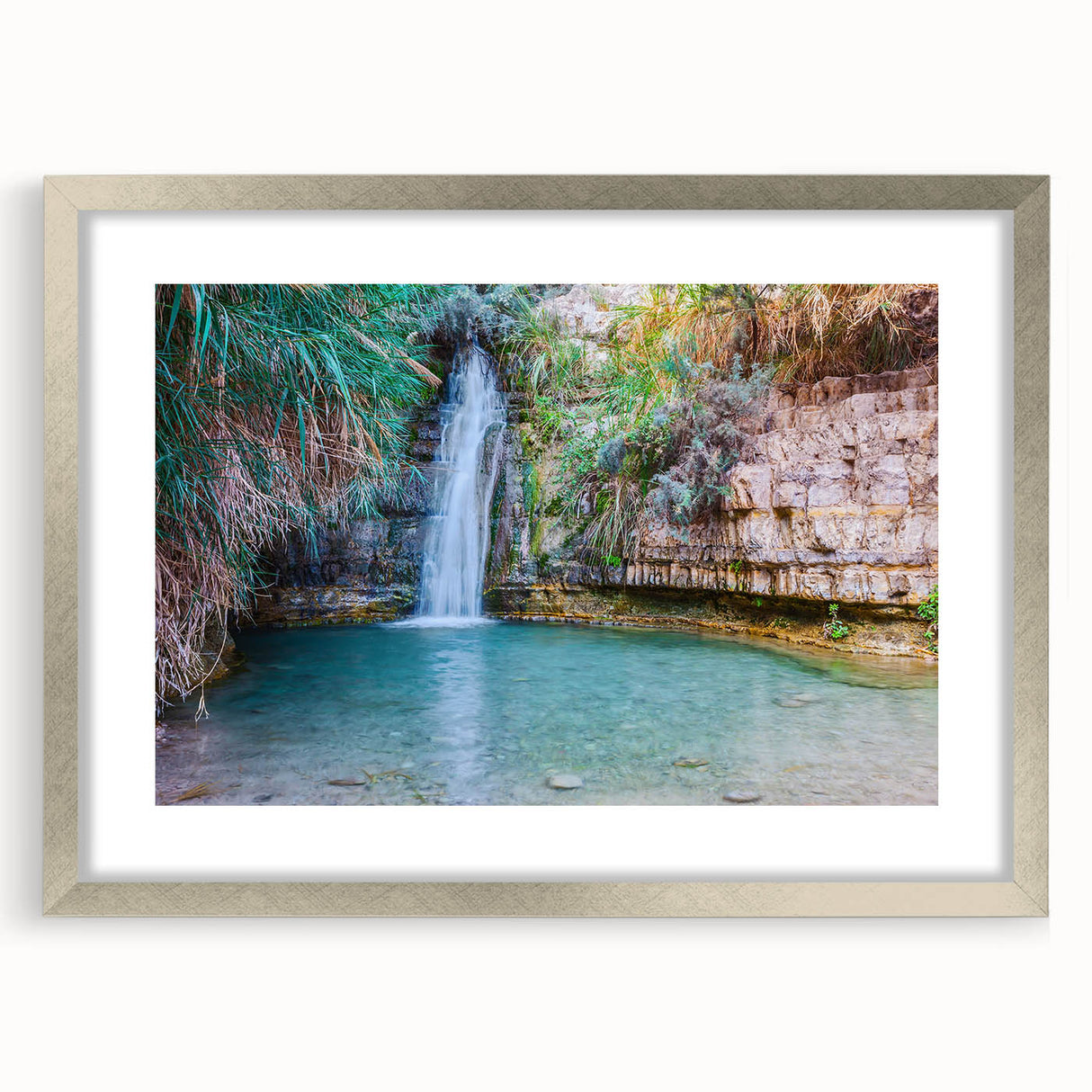 Textured abstract art print depicting Middle Eastern scenery in muted earth tones, framed in silver, ideal for bedroom art.