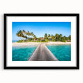 Abstract art print of vibrant oceanic hues on textured canvas, framed in black, ideal for living room decor.