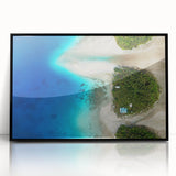 Large abstract wall art depicting a serene Micronesian ocean scene in blue tones, framed in black acrylic.