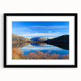 Abstract art print of Otago, New Zealand in vibrant colors on a large canvas, framed in black.