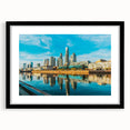 Extra large abstract art print featuring a colorful, textured depiction of a South American scenery on a black framed canvas.