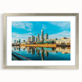 Textured abstract art print of a muted blue and gray Buenos Aires cityscape, framed in silver, ideal for bedroom art.