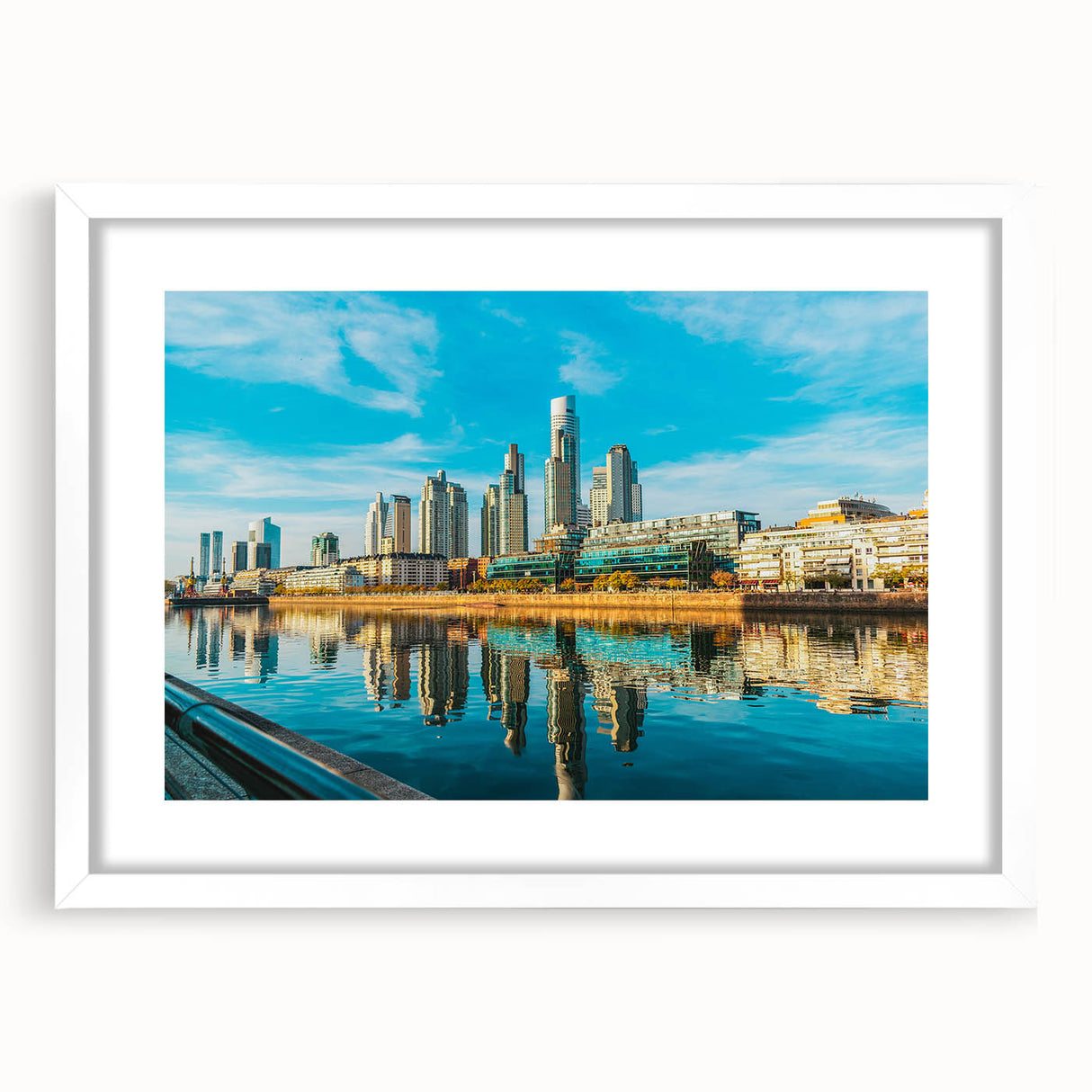Abstract art print of Buenos Aires skyline in muted gray and blue tones on a framed white mat.