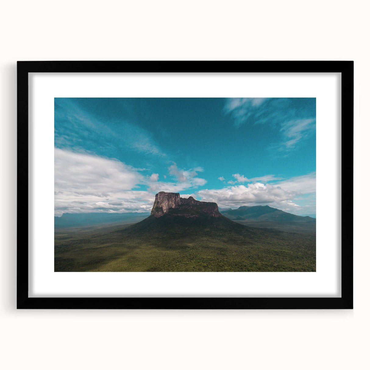 Colorful abstract art print of a Venezuelan landscape in vibrant hues on a large framed canvas, ideal for living room decor.