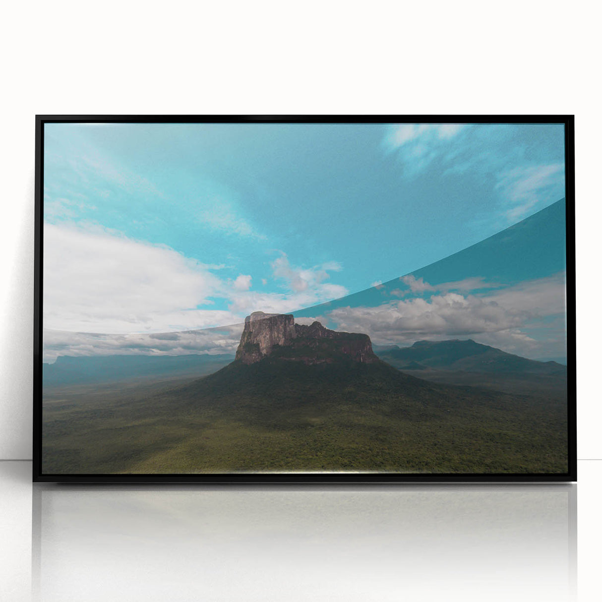 Large abstract wall art depicting a stylized Venezuelan landscape in vibrant colors on a black framed acrylic.