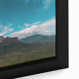 Framed canvas featuring a textured depiction of a Venezuelan landscape in black with colorful accents.