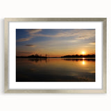 Textured abstract art print of Arkansas scenery in muted earth tones, silver-framed with mat, suitable for bedroom decor.