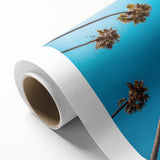 Art deco poster of Beverly Hills scenery on rolled canvas, featuring pastel shades.