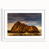 Abstract art print of California's Big Sur in muted blue and green tones on a framed white mat.