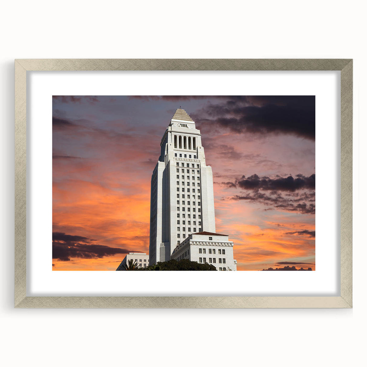 Textured abstract art print of Los Angeles skyline in muted grays and blues, framed in silver, ideal for bedroom decor.