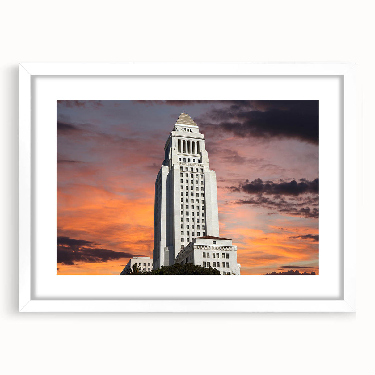 Abstract art print of Los Angeles skyline in muted gray and blue tones on a white framed poster.