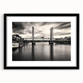Abstract art print of Sacramento scenery in vibrant multicolor on textured canvas, framed in black.