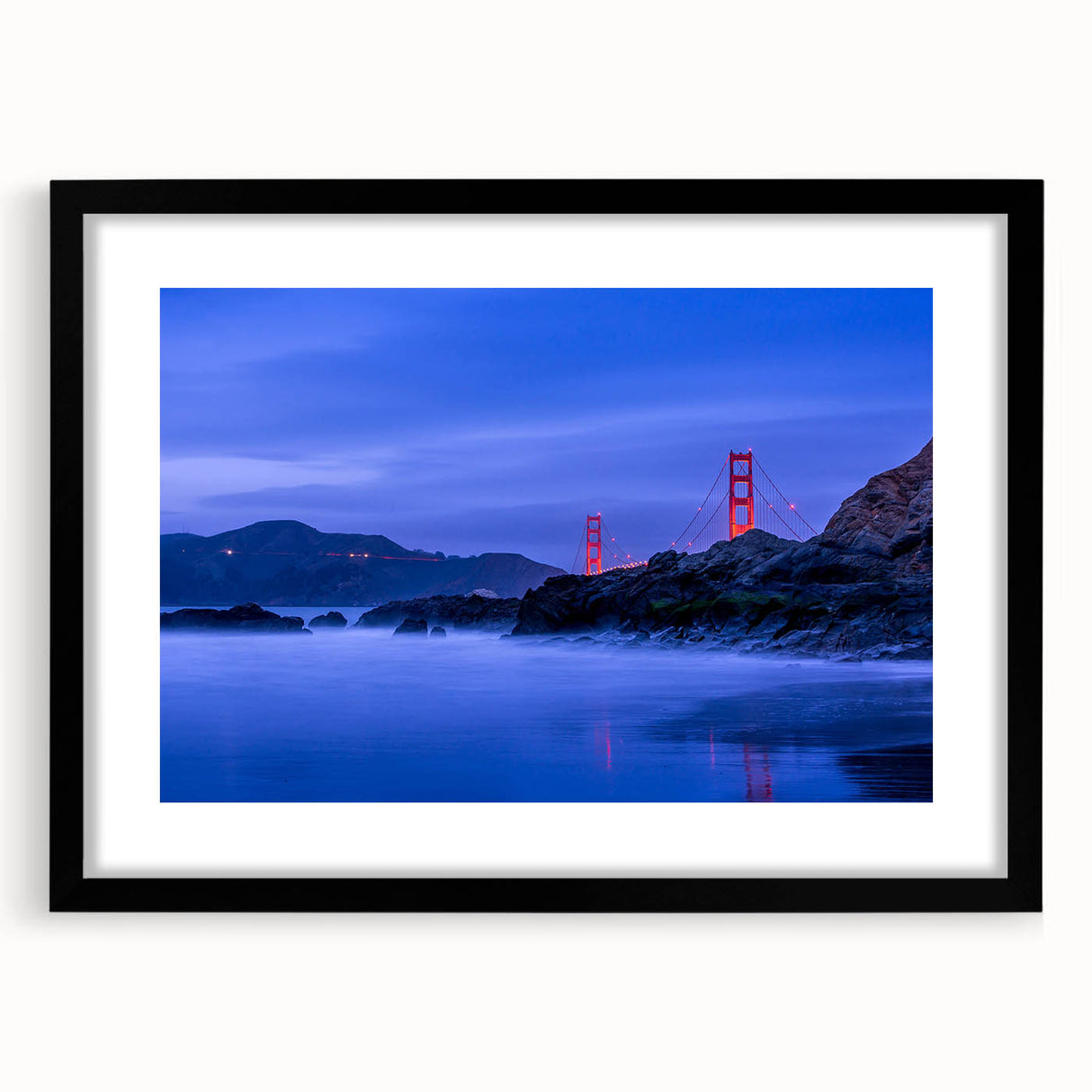 Extra large abstract art print of San Francisco skyline in vibrant colors on a textured canvas, framed in black.