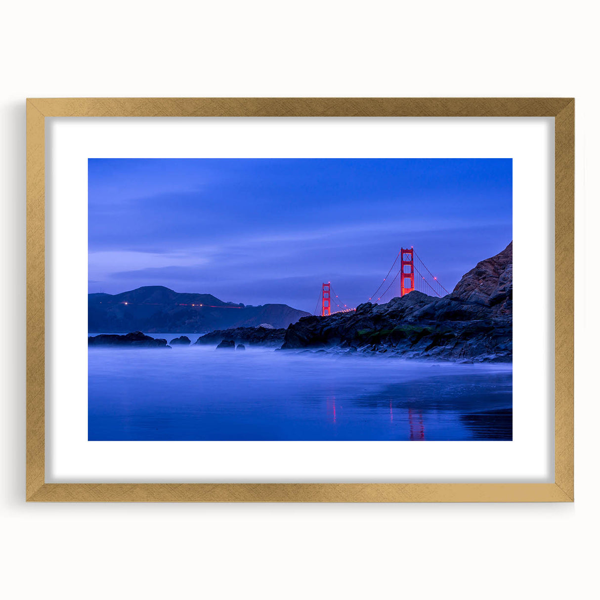 Extra large abstract art print of San Francisco skyline in muted gold and blue tones on a framed canvas.