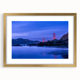 Extra large abstract art print of San Francisco skyline in muted gold and blue tones on a framed canvas.