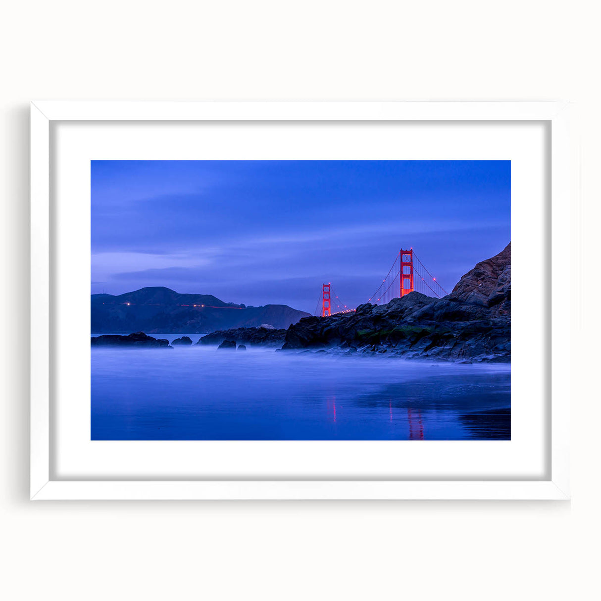 Abstract art print of San Francisco skyline in muted blue and gray tones on a white framed canvas.