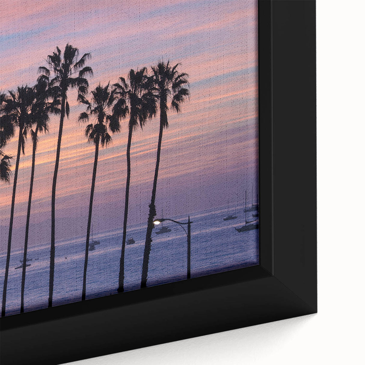Textured black wall art depicting Santa Barbara scenery on a large framed canvas, with vibrant color accents.