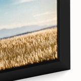 Close-up of a textured black wall art featuring a colorful Pikes Peak scenery on a framed canvas.
