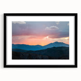 Extra large, textured abstract art print of colorful Rocky Mountains, framed in black, ideal for living room decor.