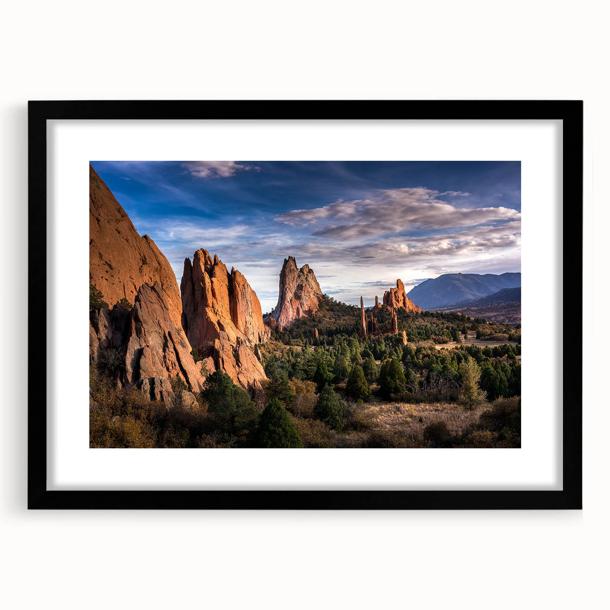 Extra large abstract art print of Colorado Springs in vibrant colors on a textured canvas, framed in black.